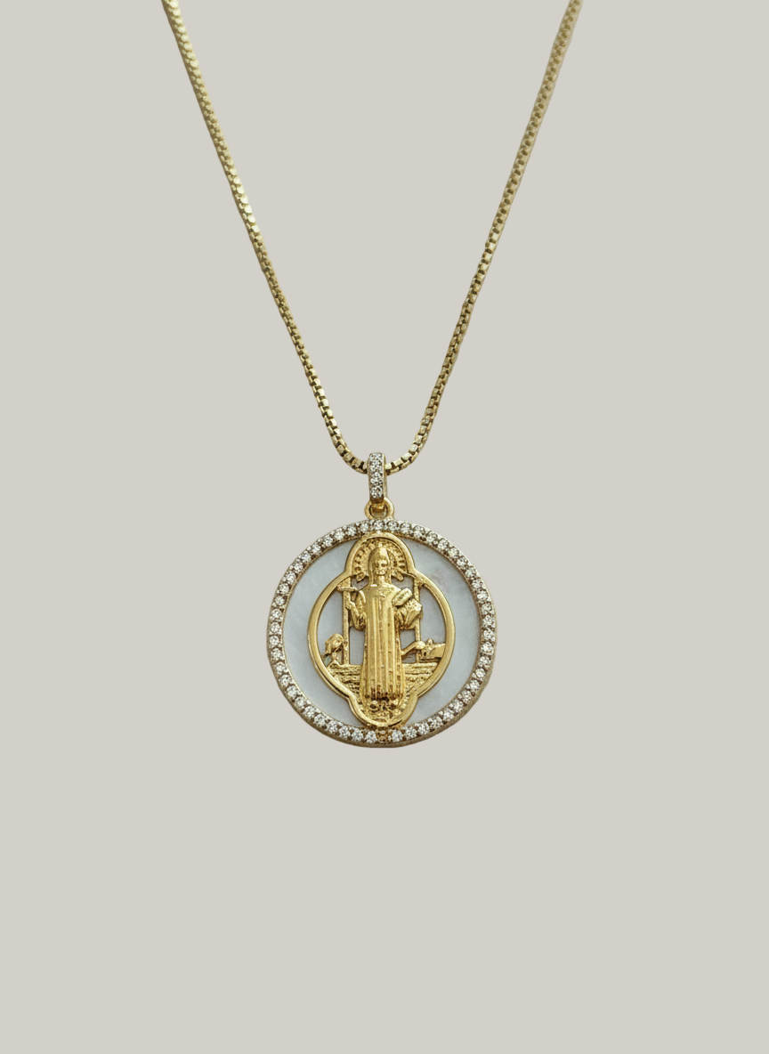 Gold necklace with cream background